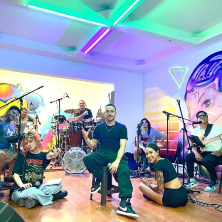 Pee Wee Kumbia Kings with his music crew before the concert.